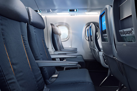 Aircraft cabin interior with aluminum seat tracks and luggage bins
